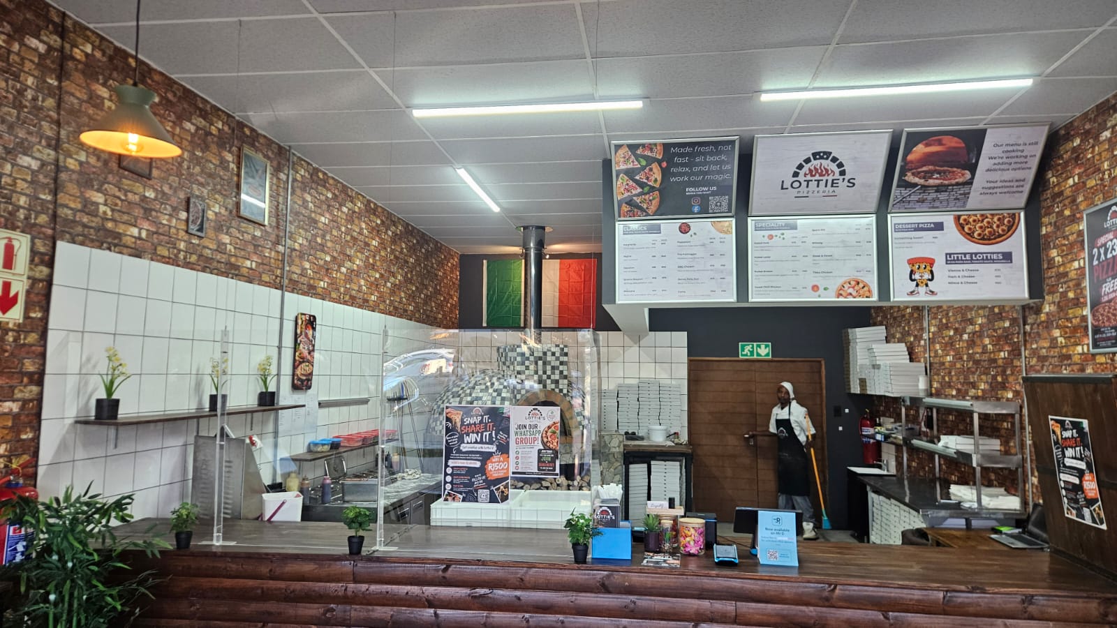 Rustic interior seating at Lottie's Pizzeria