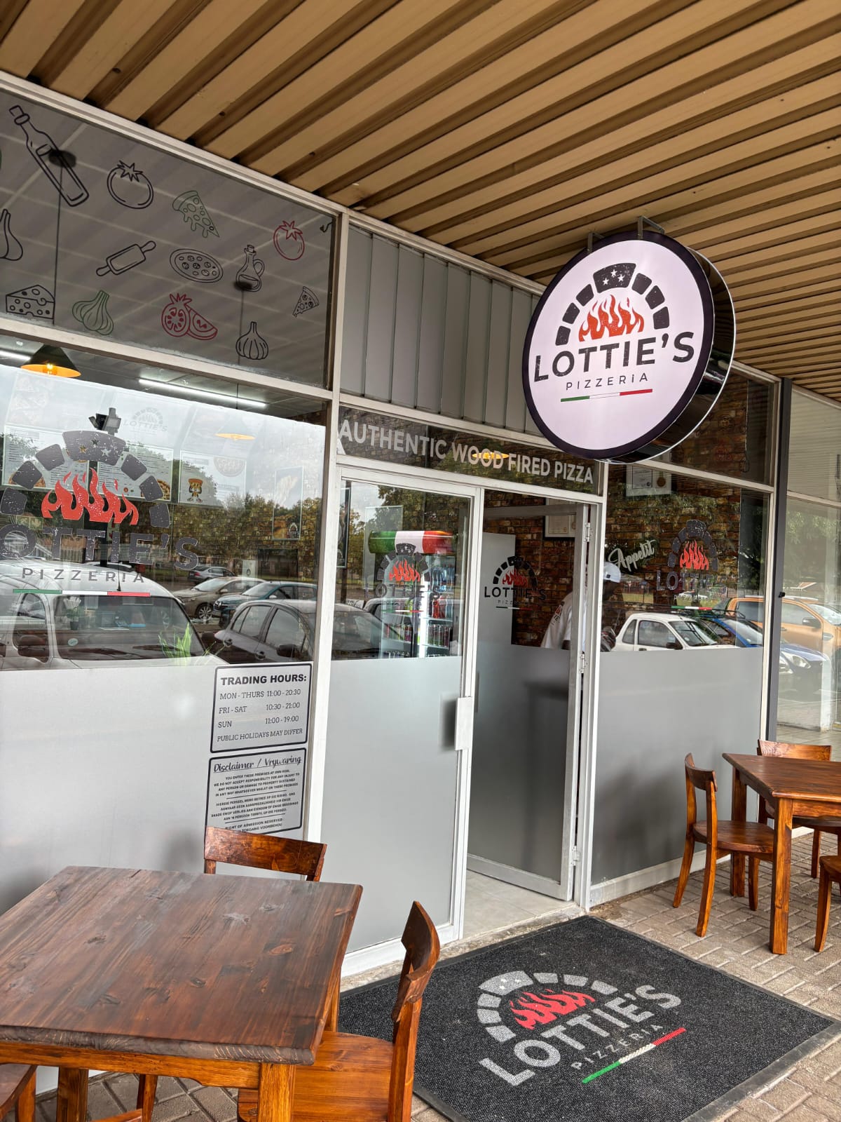 Lottie's Pizzeria storefront at Golf Park Shopping Centre